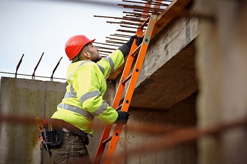 worker climbing ladder