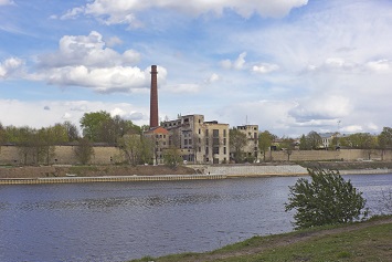 Superfund site, abandoned industrial building on river