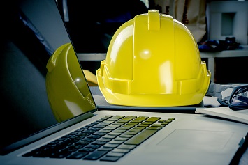 Hard hat and laptop, safety data