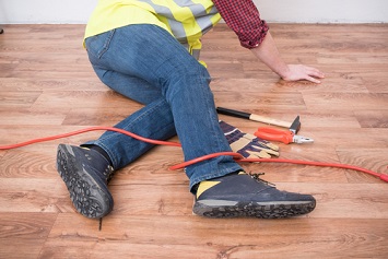 Man tripped by power cord.